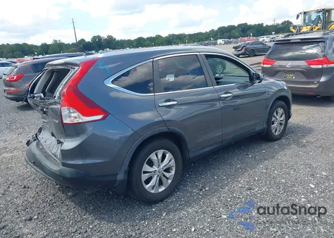 2013 Honda Cr-V Touring z USA, uszkodzony, nr VIN 2HKRM4H95DH103364